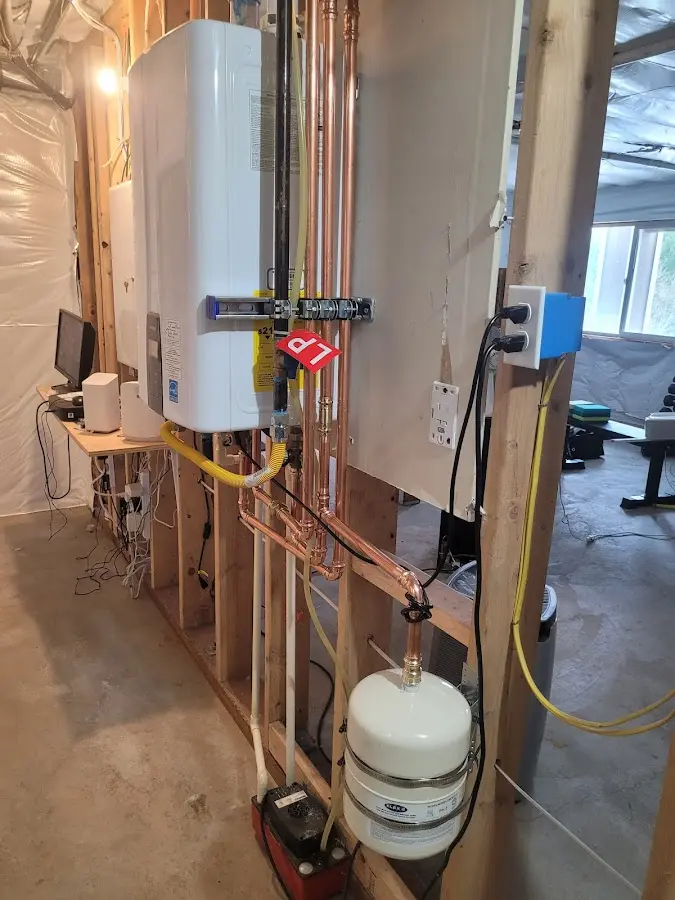 Licensed plumber repairing a kitchen sink in Columbus